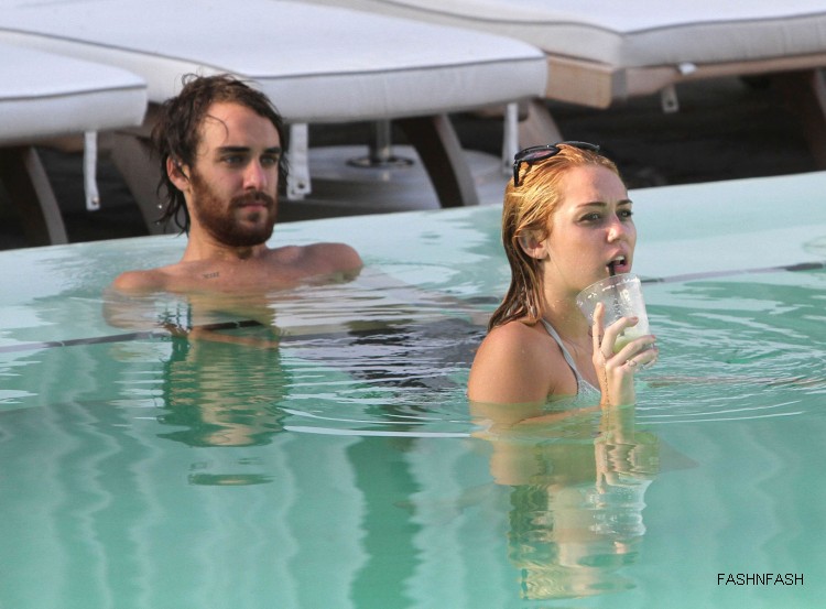 Miley-Cyrus-in-Bikini-at-a-Hotel-Pool-in-Miami-City-Pictures-Photoshoot-2012-3